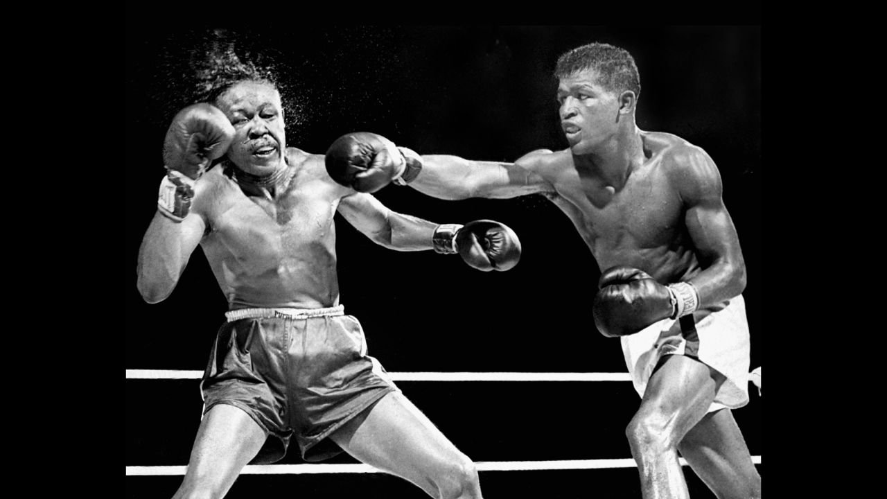 Sugar Ray Robinson landing a right hand on Kid Gavilan. Photo: Charles Hoff/NY Daily News Archive via Getty Images