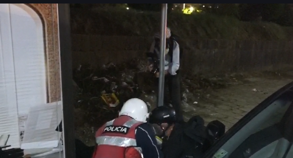 Protester struck with rubber baton falls to ground, taken away by ambulance